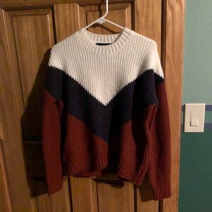 Large chunky white navy and orange sweater